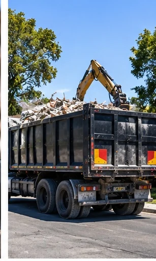 Tipper truck being loaded with demolition waste on an Illawarra site